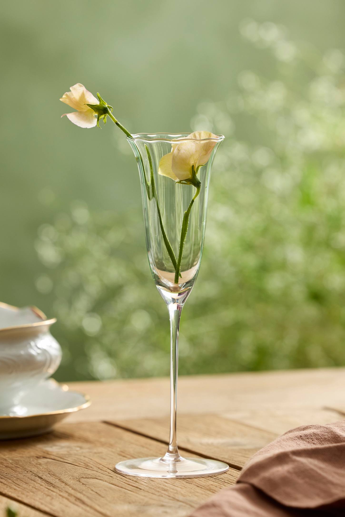 xenapaz-69.jpg Ruffled Green Glass Champagne Flute – Hand-Crafted 3.5 oz Tinted Stemware - Image 1